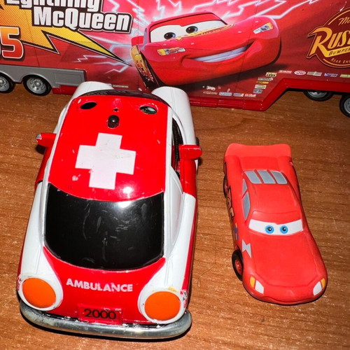 Ambulance toy car used with opening doors and pull-back mechanism