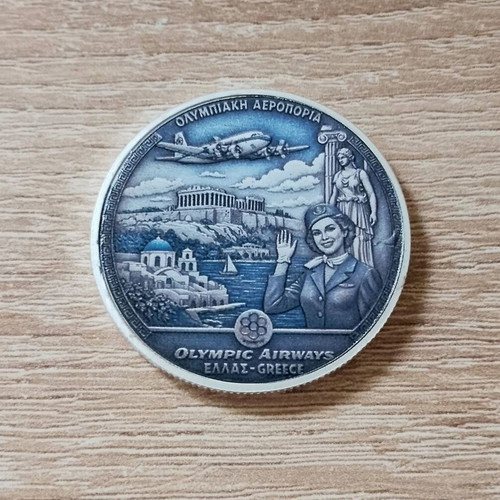 Olympic Airways commemorative coin like new with silver finish
