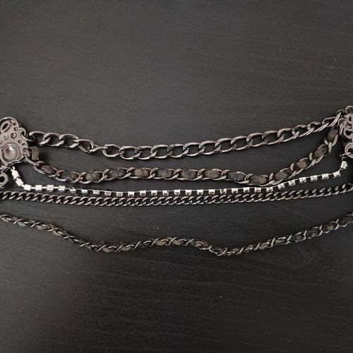 Belt Buckle Accessory used, black with rhinestones, chains and cord