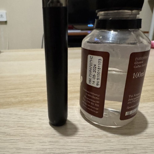 GreekBar electronic cigarette like new with glycerin pack