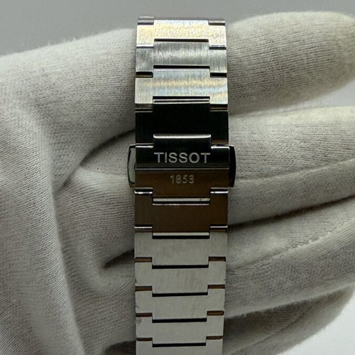 Tissot PRX Quartz watch with black dial