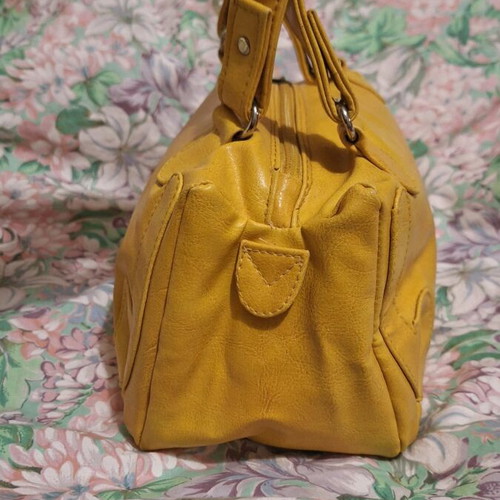 Women's mustard small hand bag used