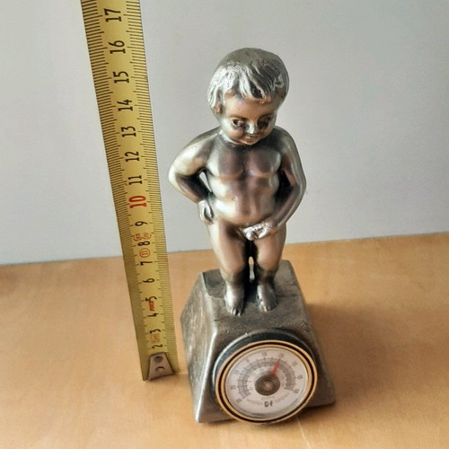 Vintage metal thermometer with small child figure like new