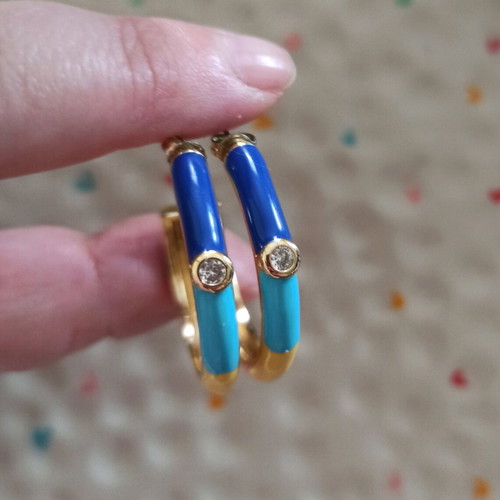 Striped multicolor hoop earrings made of steel like new