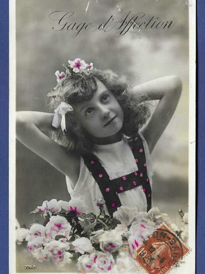 Vintage postcard used, girl with flowers