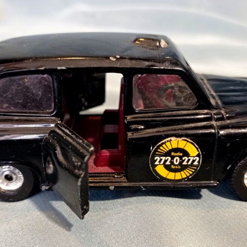 Corgi Austin London Taxi diecast model with opening doors like new