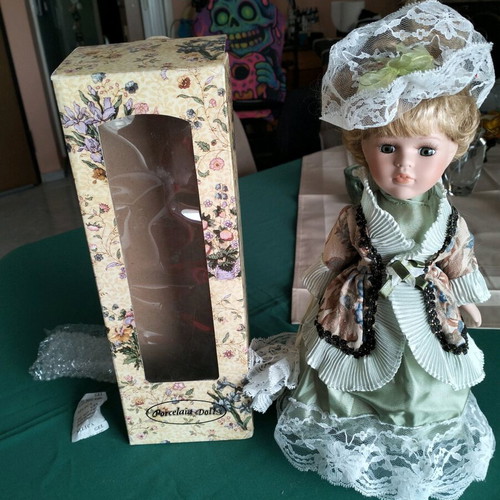 Vintage porcelain doll new in packaging