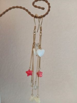 Dangling earrings with decorative beads like new