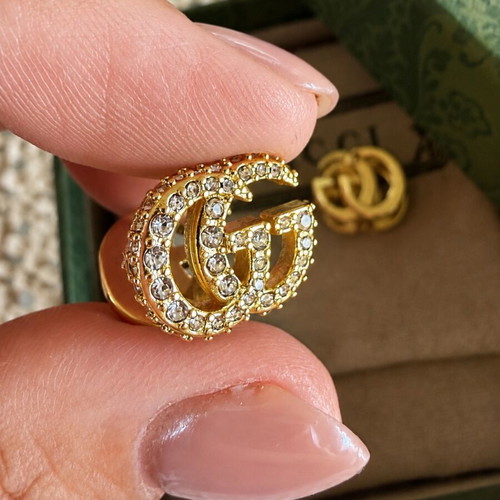 Gucci Double G gold tone earrings 2 in 1