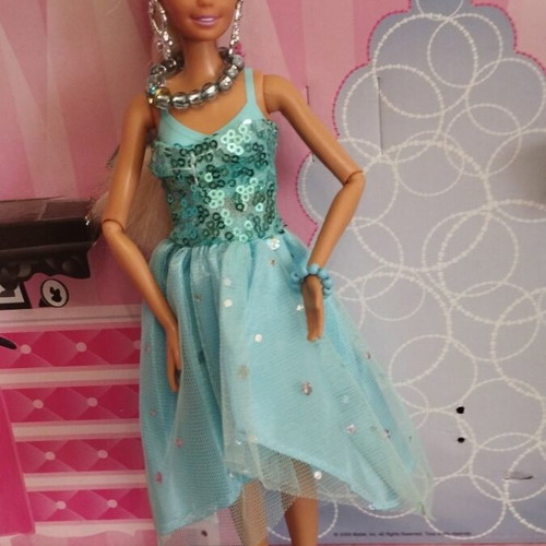 Vintage Barbie doll with handmade shoes and accessories