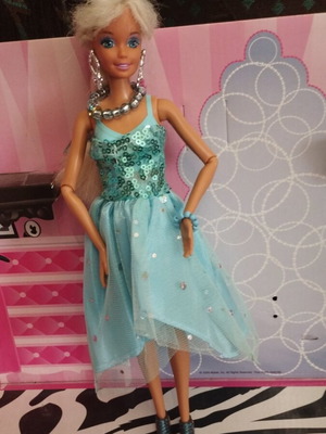 Vintage Barbie doll with handmade shoes and accessories