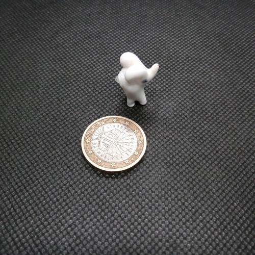 Porcelain elephant white miniature like new for crafts