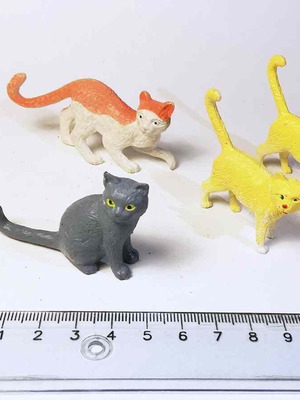 Plastic cat figures used, pack of 4