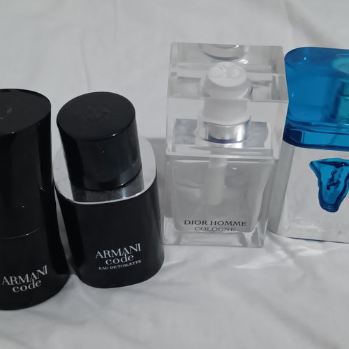 Set of 4 empty bottles from branded perfumes