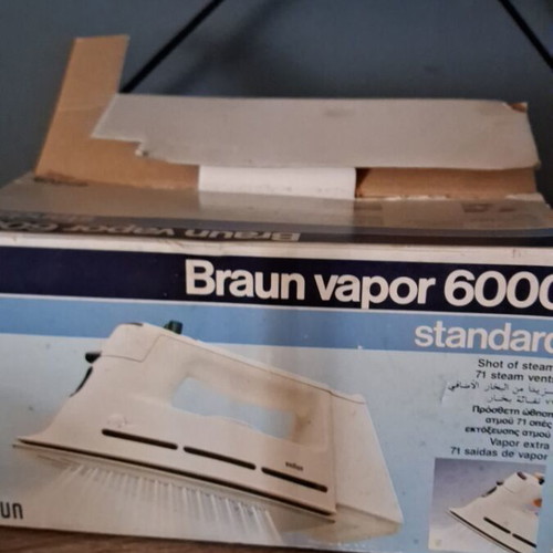 Vintage Braun iron used with signs of wear