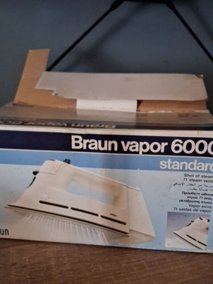 Vintage Braun iron used with signs of wear