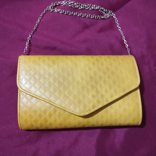Women's mango yellow envelope bag with quilted surface and gold chain