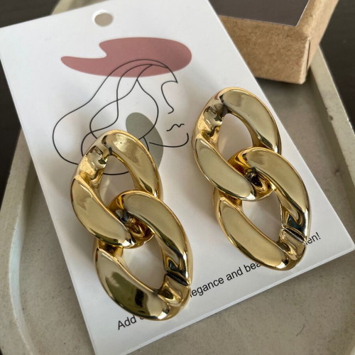 Plexiglass earrings new, gold color