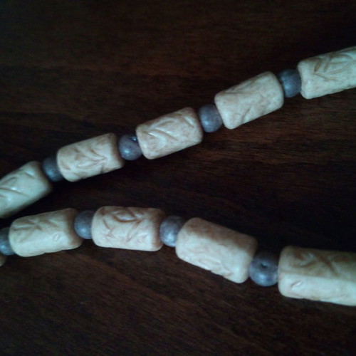 Ethnic necklace used carved bone and wood
