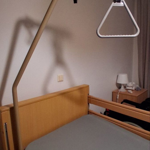Electric hospital bed like new with mattress, wheels, and patient lifter