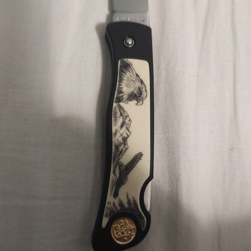 Smith & Wesson SW300N Eagle Scrimshaw knife like new, stainless steel blade