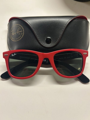 Ray-Ban Wayfarer sunglasses used, red frame
