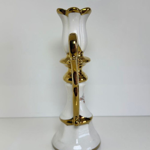 Ceramic candlestick with gold details and floral cross design