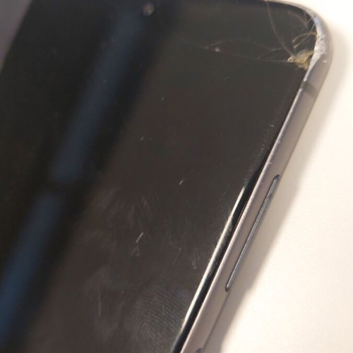 Samsung Galaxy S21 FE 5G with broken screen for parts