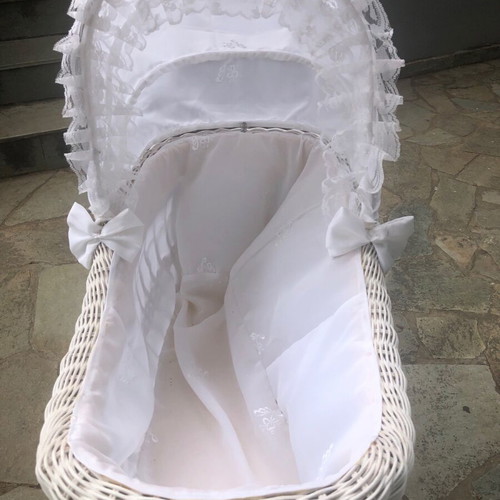 Doll pram used with white wicker basket