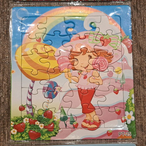 Strawberry Shortcake 3 puzzles new, sealed with hanging hole