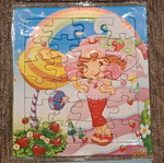 Strawberry Shortcake 3 puzzles new, sealed with hanging hole