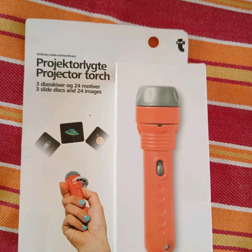 Mini projector and soft doll like new pack