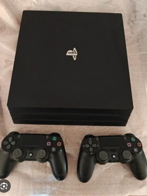 PlayStation 4 Pro console like new with 2 controllers and 2 games