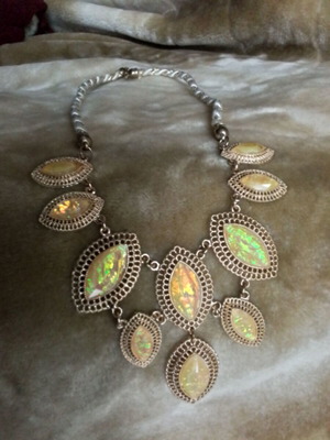 Necklace used with iridescent white and beige shades