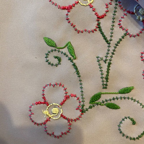 Handmade table linen with embroidery and lace used