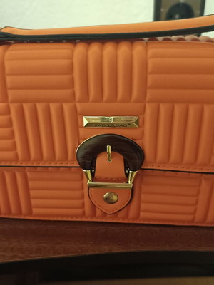 Bag to Bag quilted crossbody bag like new, orange with wooden clasp