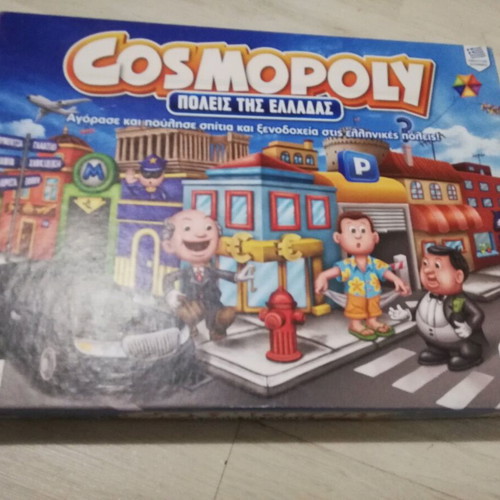 Cosmopoly board game used, missing one die and a pawn base