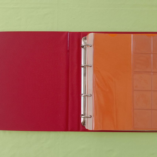 Coin album used with 5 slides for 133 coins
