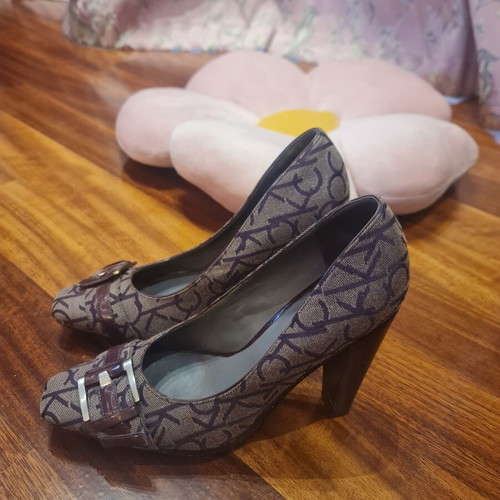 Calvin Klein burgundy high heels used with unique design