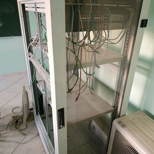 Rack cabinet for network equipment used with glass door