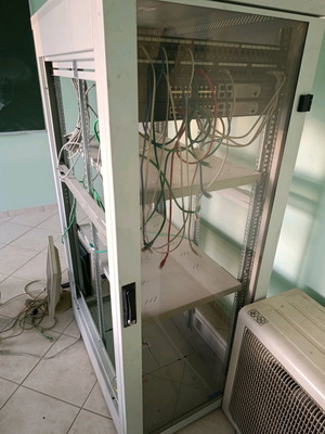 Rack cabinet for network equipment used with glass door