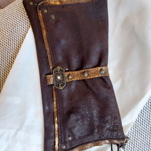 Leather women's clutch bag like new, brown with metal details and chain