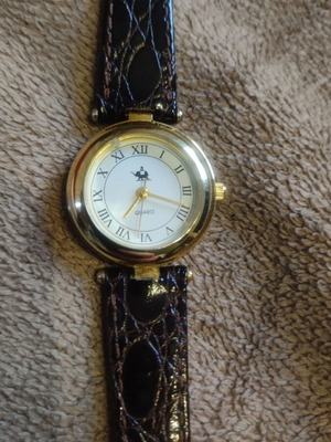 Women's watch with brown leather strap like new