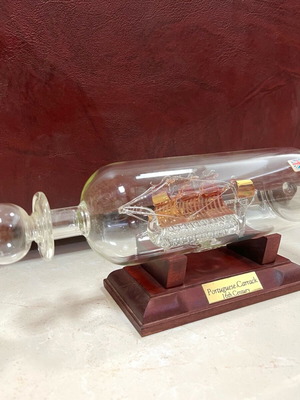 Ship in bottle collectible, new with wooden base