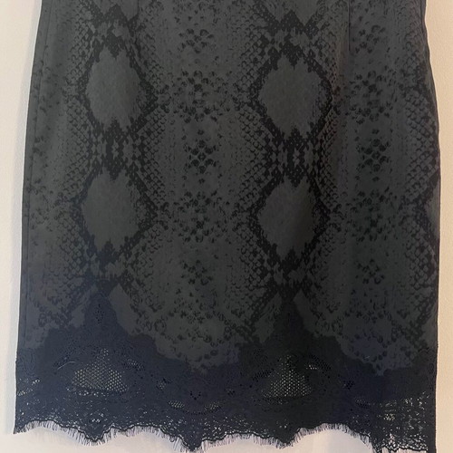 Lauren Vidal short skirt with snake skin pattern and lace trim