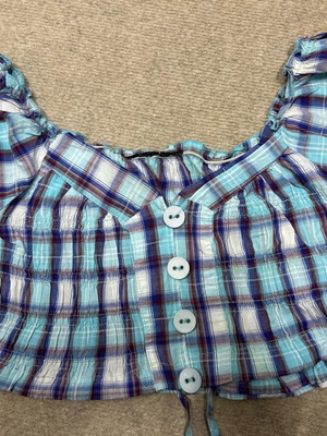 Women's checked crop top used with short sleeves and buttons