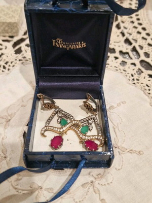 Vintage earrings made of silver and gold with emeralds and rubies like new