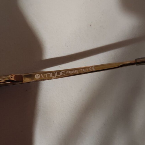 Vogue children's sunglasses like new, black and gold