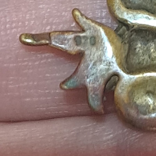 Vintage metallic pendant used, missing 2 stones