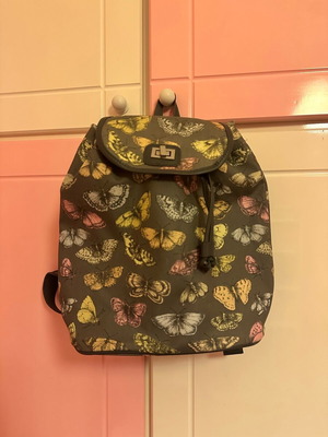 Large butterfly backpack used, spacious capacity